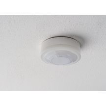 Détecteur de présence blanc 360°. IP 54. Contact renforcé 10 A. LED = max 400W. Montage en Fixation saillie plafond. Détection Diamètre 10 m à 2.5 m de haut. Réglage tempo 15 sec-30 min + impulsion. Réglage possible par télécommande. Réf. 1030062