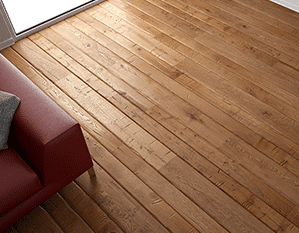 Vue d'un salon avec plancher en bois avec un fauteuil