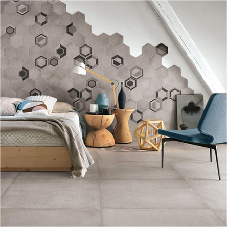 Chambre avec un carrelage hexagonal mur